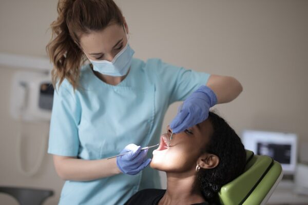 dentist using dental cement