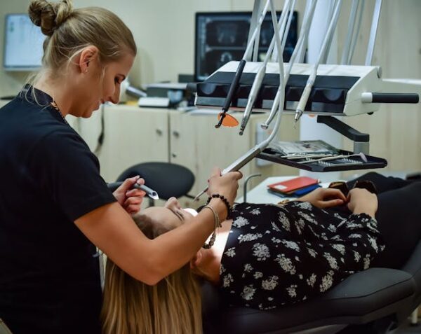 new dentist that is transitioning from dental school to clinical practice working on a new patient