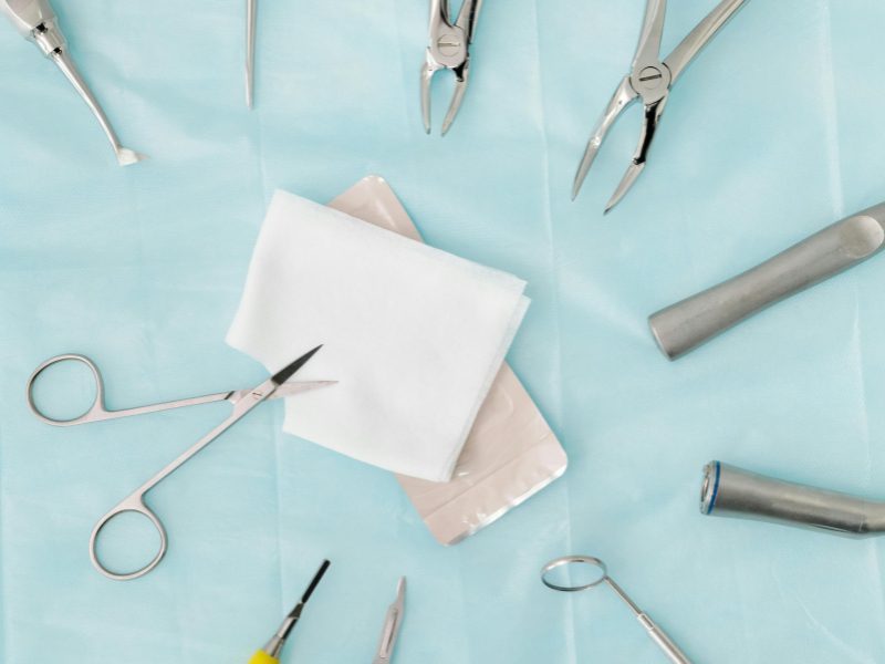 dental-assistant-has-a-tray-to-restock-the-treatment-room