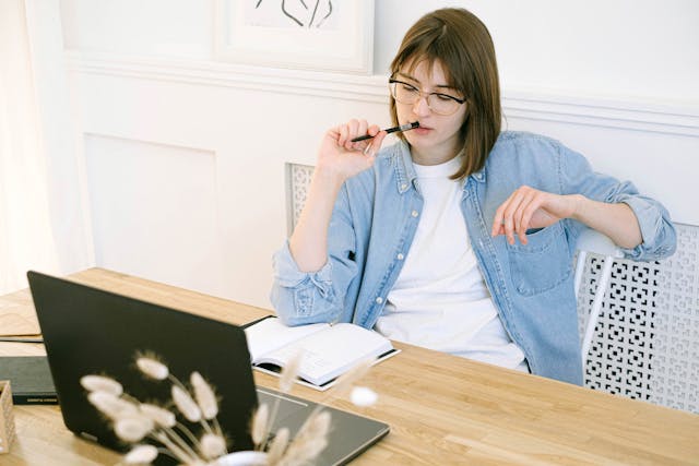 dental-assistant-thinking-about-how-to-earn-more-money