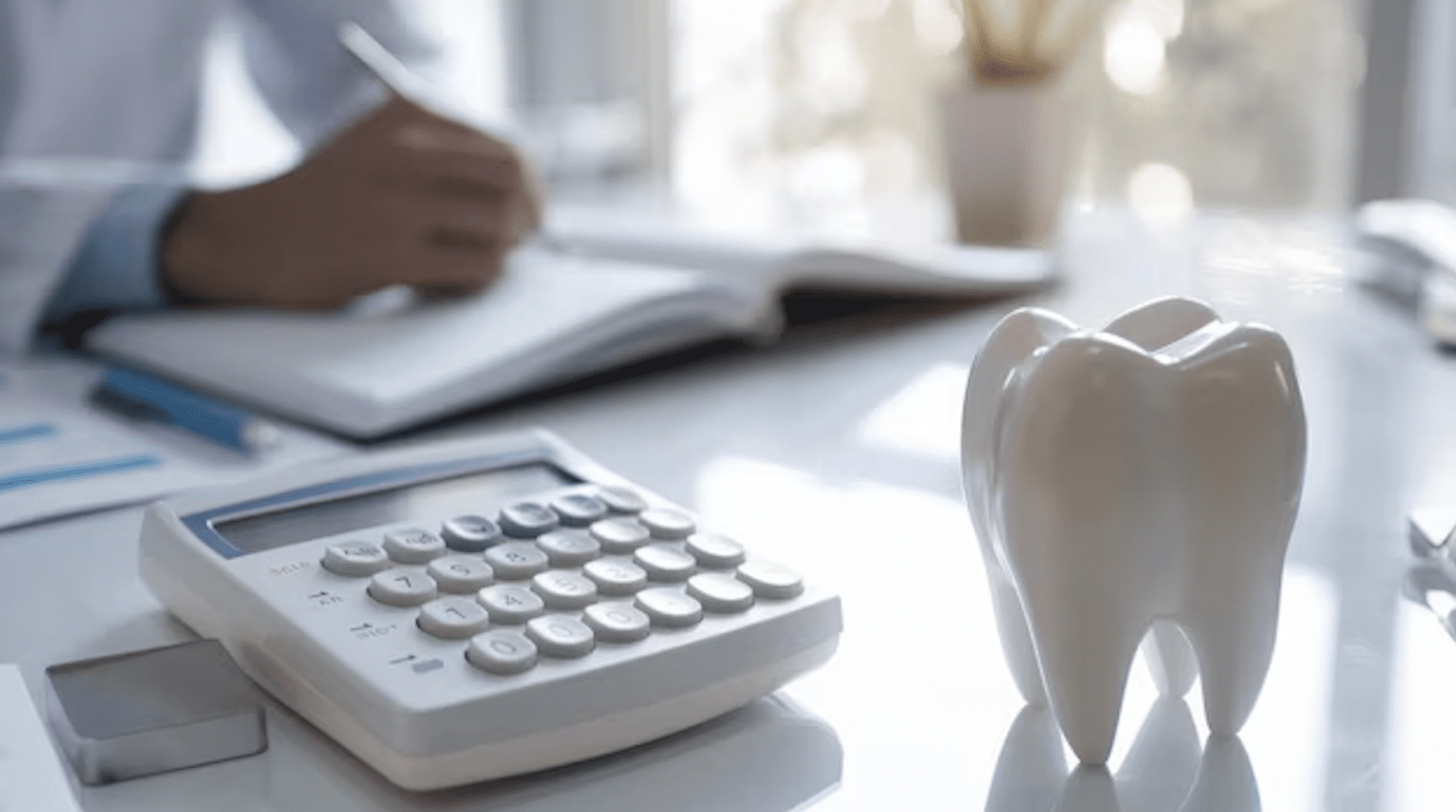dentist-using-a-calculator