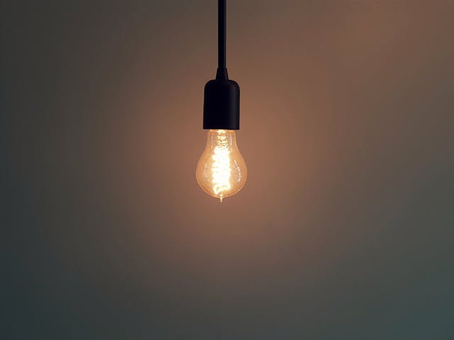 lightbulb-shining-light-on-the-lessons-learned-from-a-first-year-dentist